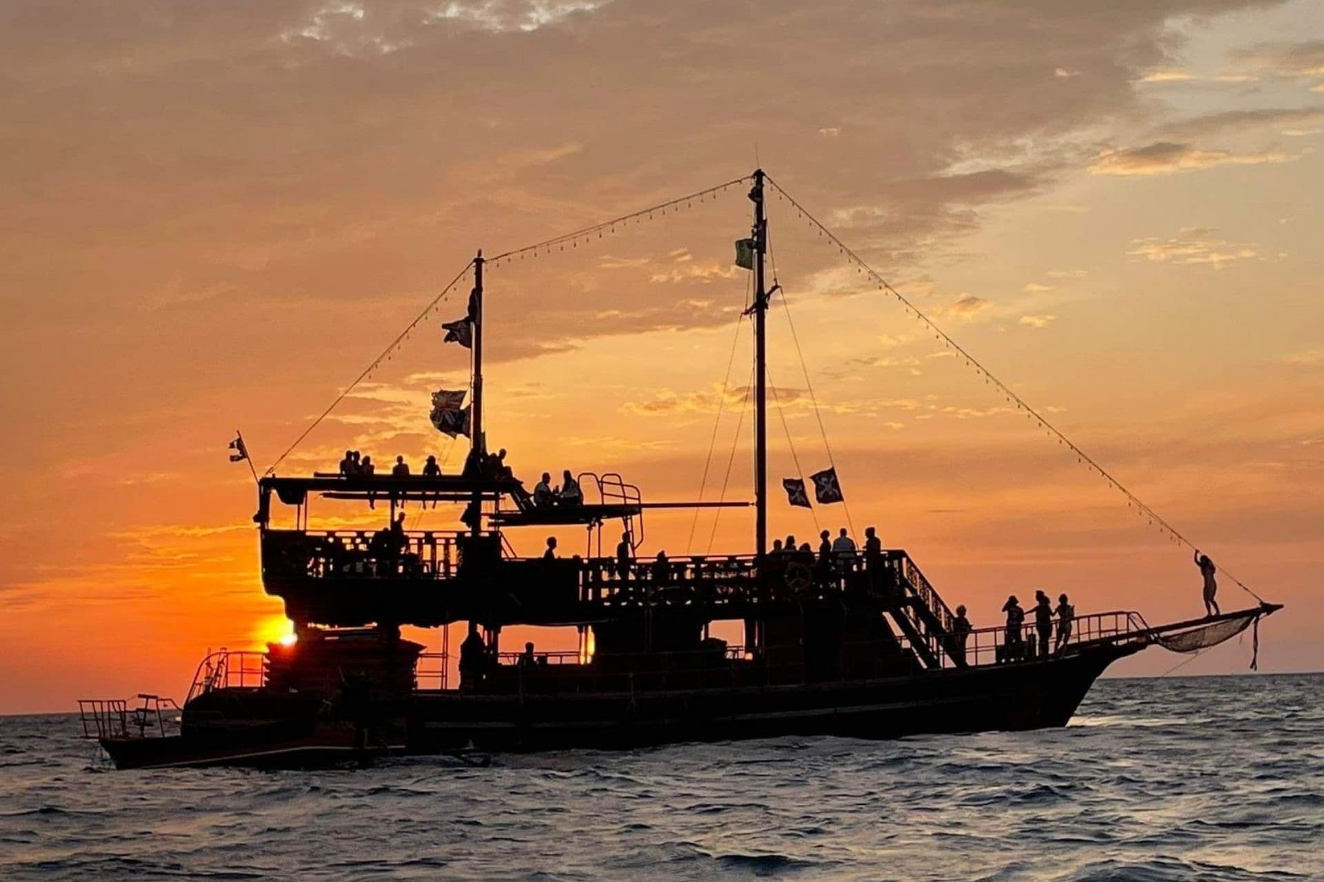 The Dragon silhouetted against a blazing Andaman sunset